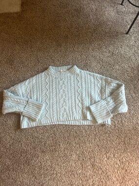 Light blue cable knit sweater